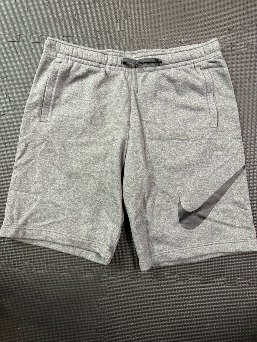 Nike Men's Light Gray Athletic Shorts with Black Swoosh